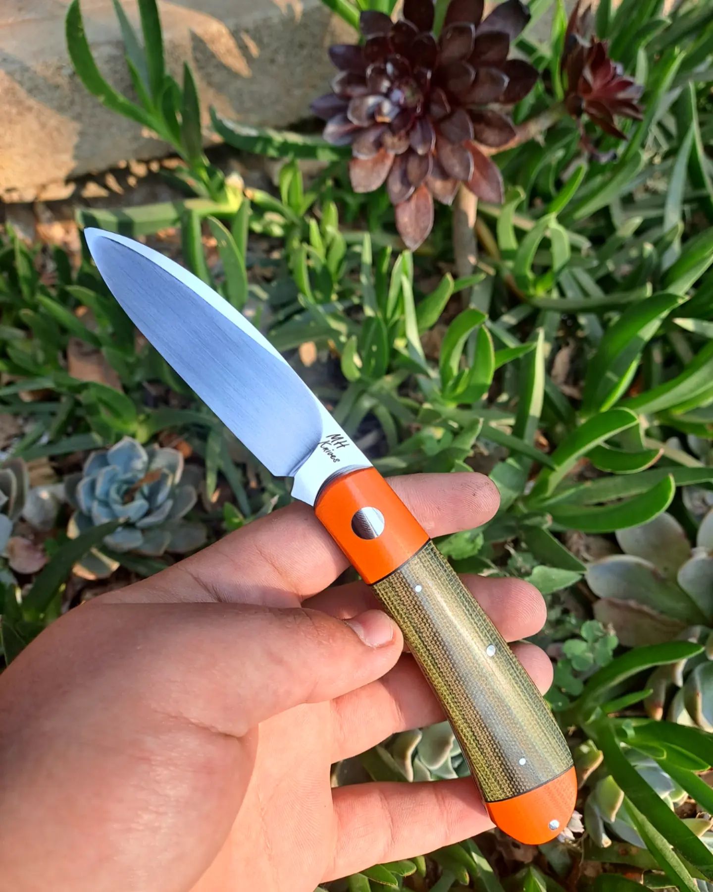 MH Knives fixed blade — orange bolster and canvas Micarta handle